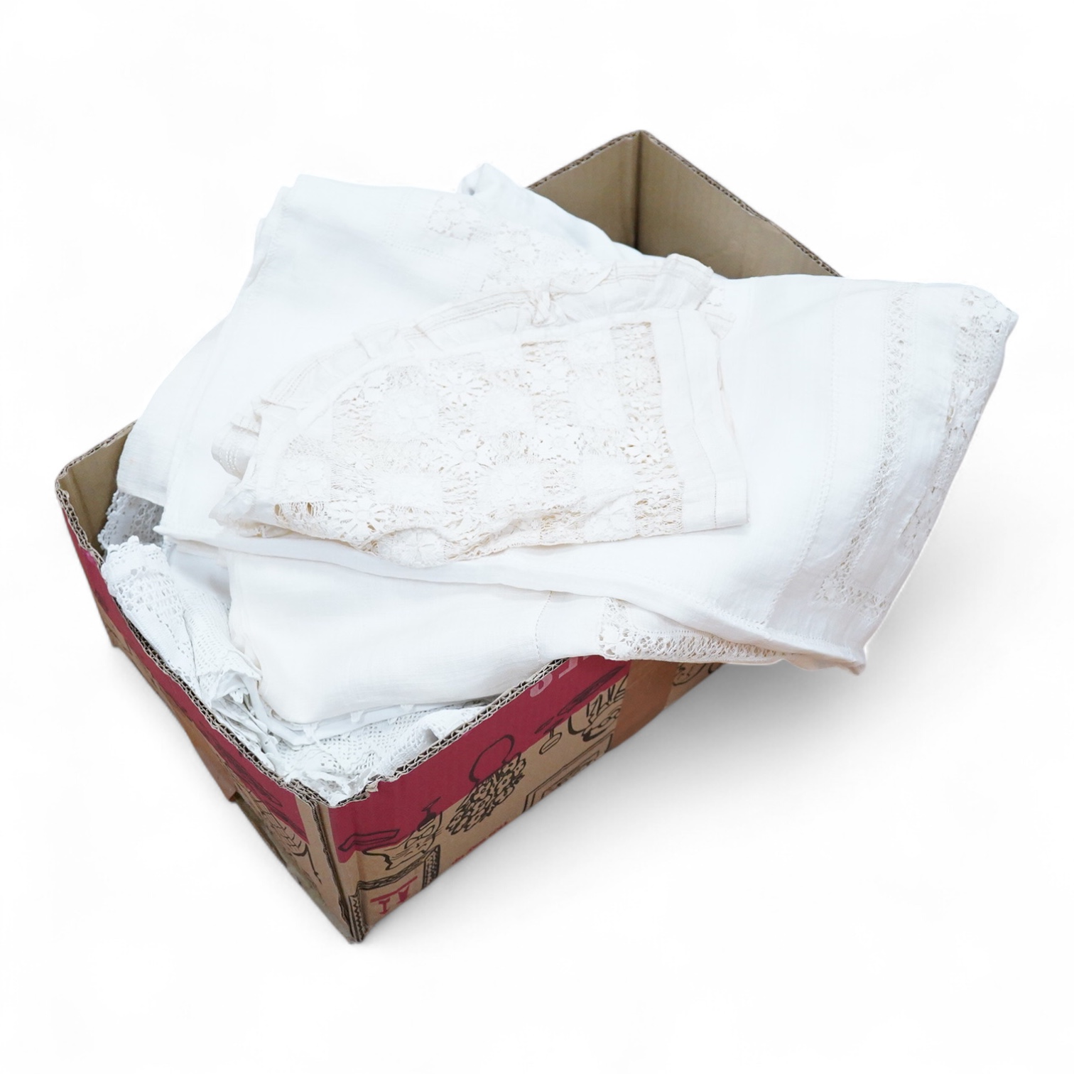 An ornate pineapple linen table cloth - 220cm x 190cm and a similar tea cosy, together with a collection of crochet edged, embroidered and cutwork table linens.